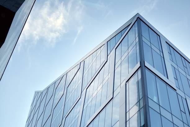 istock Abstract reflection of modern city glass facades. 1204984432
