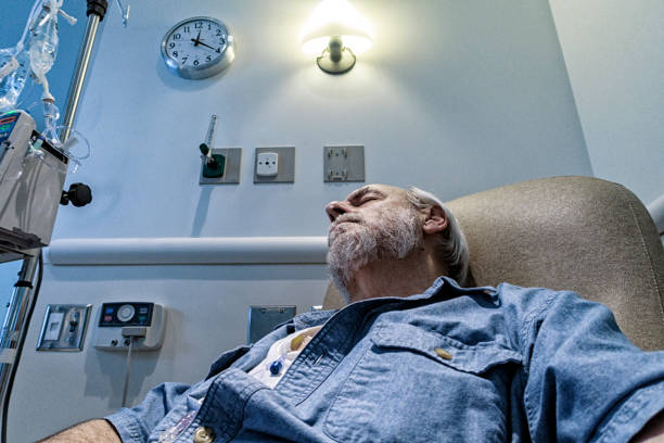 istock Senior Man Cancer Patient Sleeping During Chemotherapy IV Infusion 1204986070