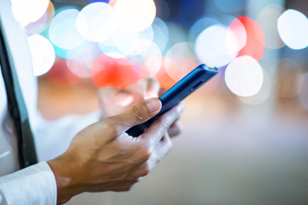 istock businessman use phone outdoor 1204987284