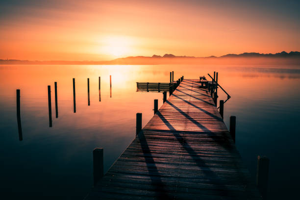istock Sunrise and Sunset at a small lake on the coastline 1204987528