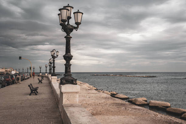 istock Bari seafront lights. Coastline and Twilight purple and blue sky. 1204987742