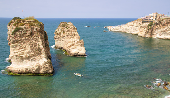 Beirut, Lebanon - probably the most popular landmark in Beirut, the Raouché Rocks are a wonderful spot visitated by thousands of tourists every day