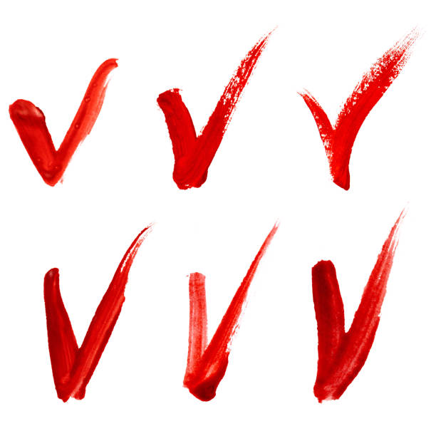 Set of check marks made with a red paint