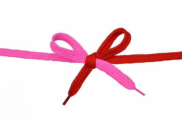 Pink and Red shoelace stock photo