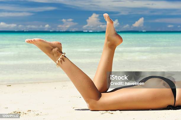 Womens Legs On A Beach Stock Photo - Download Image Now - Adult, Back, Beach