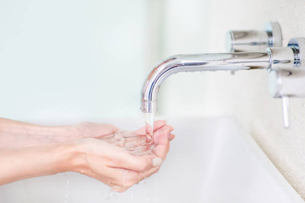 istock full water in the hand 1204996292