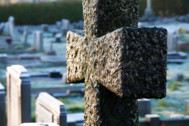 istock Cross pattee memorial on cold winter morning 1205000371