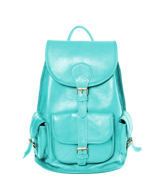 istock Leather backpack standing isolated on white cyan color 1205002287