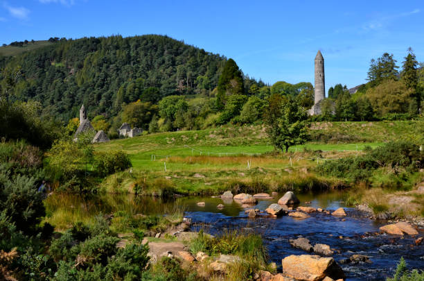 istock landscape with old celtic round tower in Glendalough 1205005449