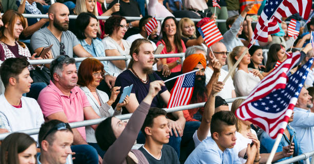 istock USA Supporters Waving Their Flags 1205007422