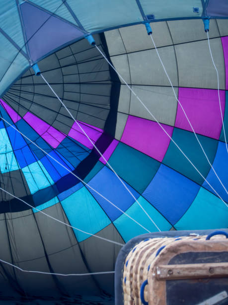 istock Inflating the hot air balloon while at the ground 1205008398