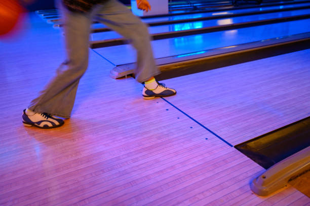 istock Bowling alley woman playing sport 1205014521