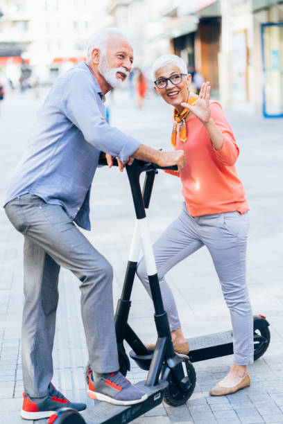 istock Modern senior couple with electric scooter 1205016592