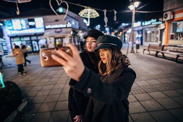 istock Beautiful friends are taking selfie 1205019138