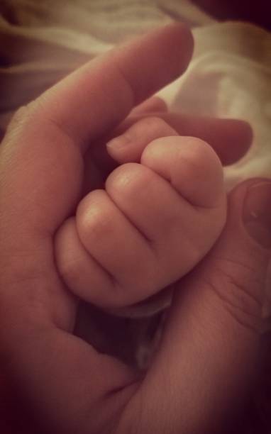 istock Baby fist 1205022985