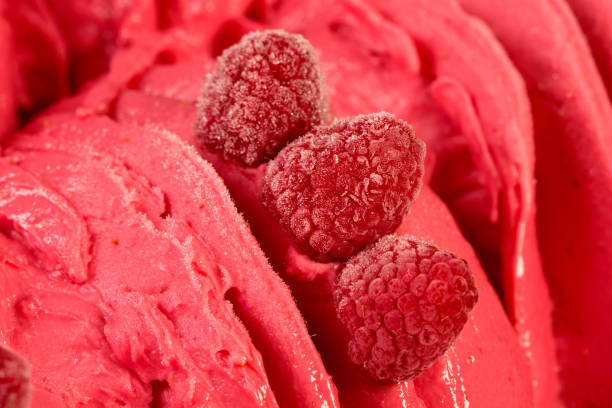 istock Watermelon cherry flavoured sorbet texture with raspberries. 1205024068