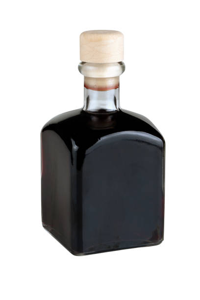 istock Homemade cherry liqueur in squared bottle 1205024189