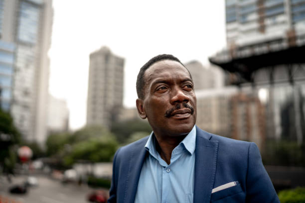 istock Thoughtful businessman looking away 1205026861