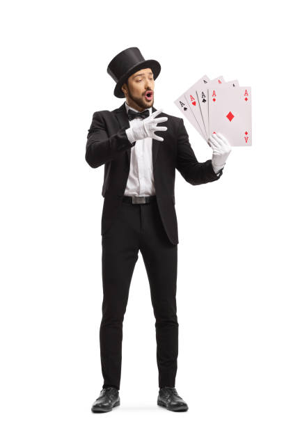 istock Magician performing a magic trick with playing cards 1205028719
