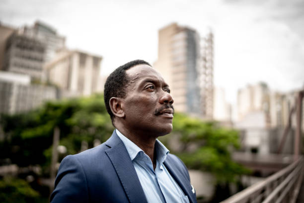 istock Thoughtful businessman looking away 1205028889