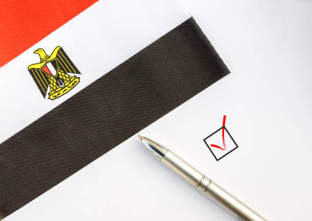 Pencil, Flag of Egypt and check mark on paper sheet