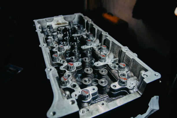 istock disassembled car engine repair, valve adjustment 1205033750