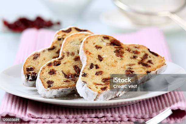 Closeup Of Three Slices Of Stollen Served On A White Plate Stock Photo - Download Image Now