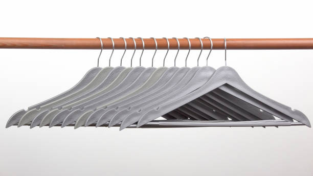 istock Set of gray clothes hangers on a white background. 1205038335