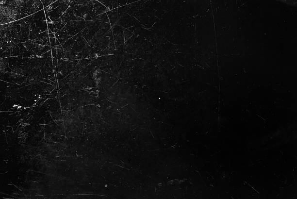 istock White scratches and dust on black background. Old dirty glass. 1205042121