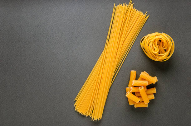 istock Postcard, background - italian traditional pasta on a gray background 1205045268