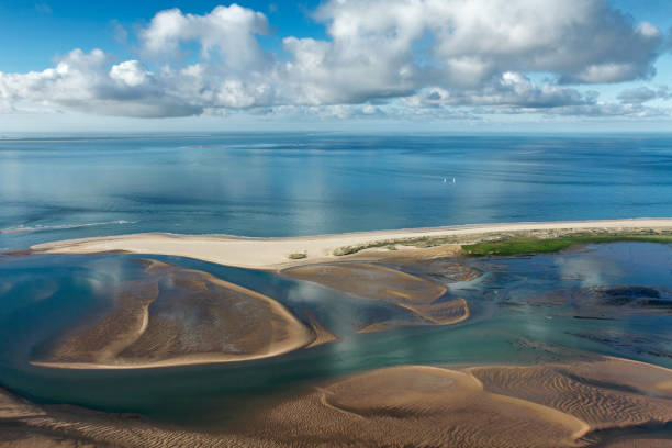 istock Anse de la Palmyra and cloud seen from the sky 1205046078