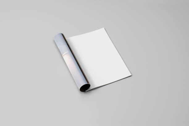 istock Mock-up magazine, newspaper or catalog on gray background. Blank page 1205047197