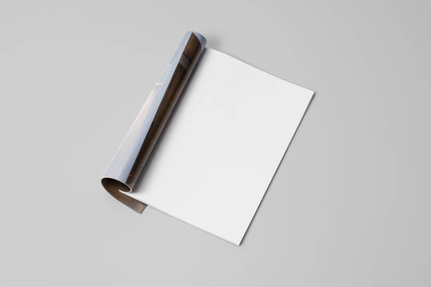 Mock-up magazine, newspaper or catalog on gray background. Blank page Mock-up magazine, newspaper or catalog on gray background. Blank page or notepad on paper backdrop. Blank page for mockups or simulations. modern magazine layout stock pictures, royalty-free photos & images