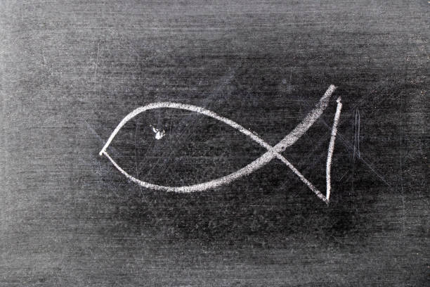 istock White chalk drawing in fish shape on blackboard background 1205052359
