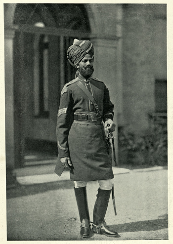Vintage photograph of British Indian Army, Duffadar of the 1st Bengal Cavalry,1890s. 19th Century. Duffadar was in the Indian Imperial Police and certain divisions of the Indian Army under British rule: a junior officer who is a native of India; (in regiments of the irregular cavalry) specifically a non-commissioned officer equivalent in rank to a corporal.