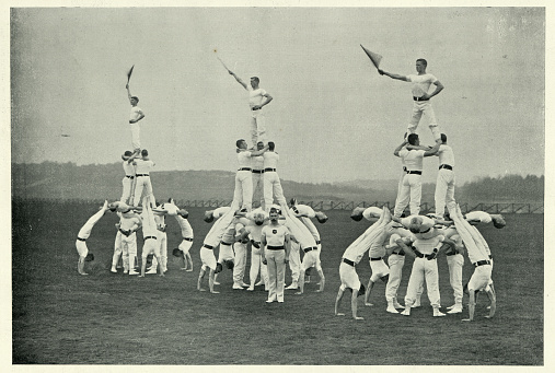 Vintage photograph of Victorian british army, Gymnastic team, Living pyramids display by the training staff at Aldershot gymnasium. 1890s.  19th Century