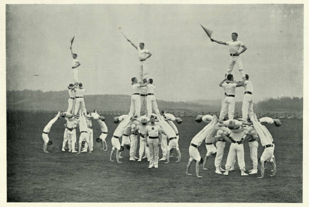 Victorian british army, Gymnastic team, Living pyramids display, 1890s Vintage photograph of Victorian british army, Gymnastic team, Living pyramids display by the training staff at Aldershot gymnasium. 1890s.  19th Century acrobatic activity photos stock pictures, royalty-free photos & images