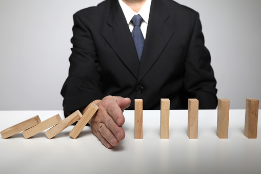 Risk management insurance protection domino effect