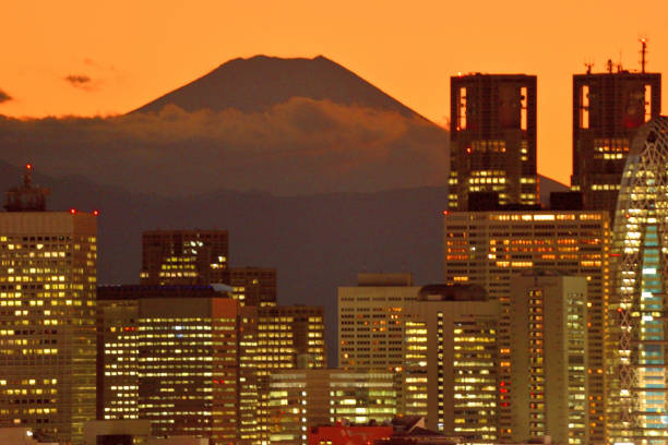 These photos of Mt Fuji and Tokyo skyline were taken in the cold morning and evening of January/February, when the air was clear. The skyline is that of high-rise buildings in Shinjuku, one of major sub-centers of Tokyo.