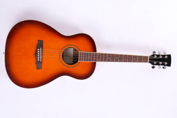 istock Smaller sized guitar with mahogany neck and a smooth rosewood fingerboard 1205061233