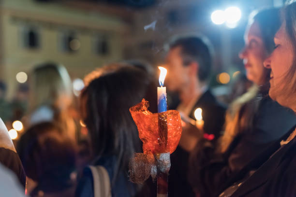 People celebration with lit candles Easter night outside Agios Minas Cathedral Heraklion, CRETE, GREECE - 28 APRIL 2019: People celebration with lit candles Easter night outside Agios Minas Cathedral herakleion photos stock pictures, royalty-free photos & images