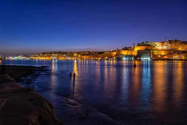 istock Valletta Night City Skyline Sea View In Malta 1205067207