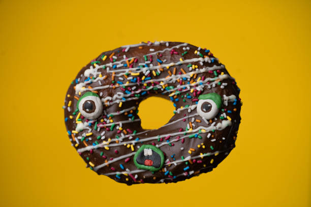 Sprinkle chocolate donut in a state of shock