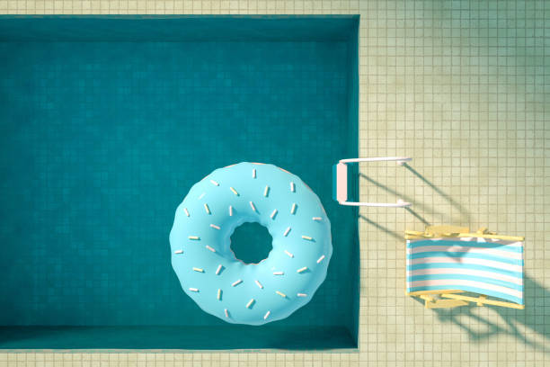 summer concept with swimming pool and donuts, aerial view - inflatable ring inflatable float swimming equipment imagens e fotografias de stock