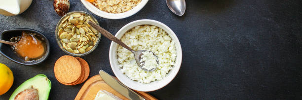 istock healthy breakfast, cottage cheese, coffee and other (tasty snack) menu concept background. top view. copy space 1205068703