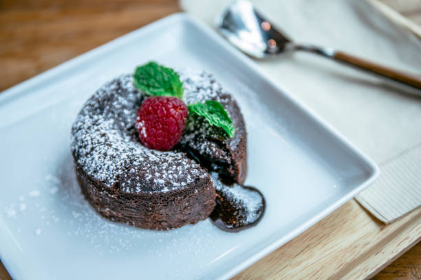 istock chocolate lave and raspberry fruit and pepper mint dessert in coffee cafe 1205069189