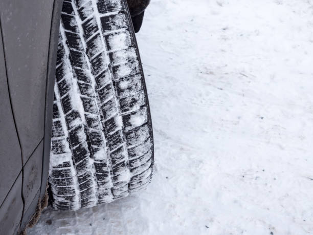 istock Profile of winter tyres with snow 1205073289
