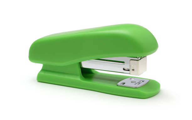 cucitrice di plastica isolata su un bianco - clip white red green foto e immagini stock