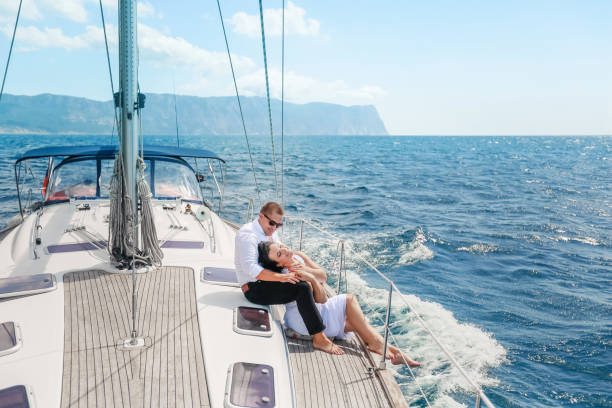 istock Romantic journey of lovers on a yacht 1205076648