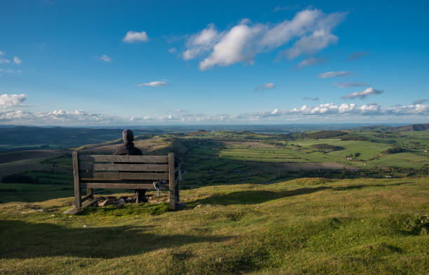 istock Person looking over countryside 1205078399